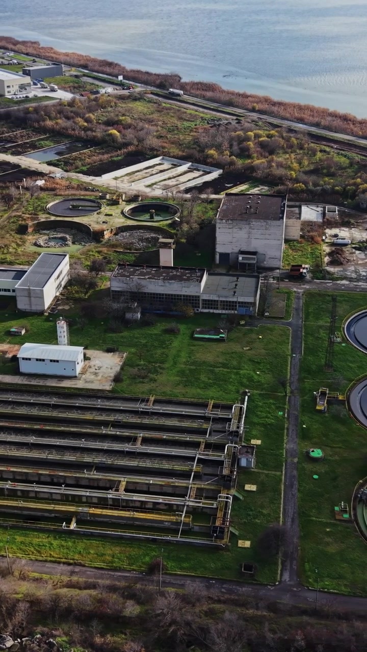 Water treatment facility located near a river and surrounded by green land