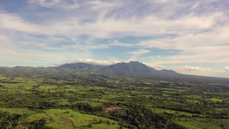 astonishing view of mount talinis from zamboanguita in negros oriental, philippines on a sunrise - wide drone shot