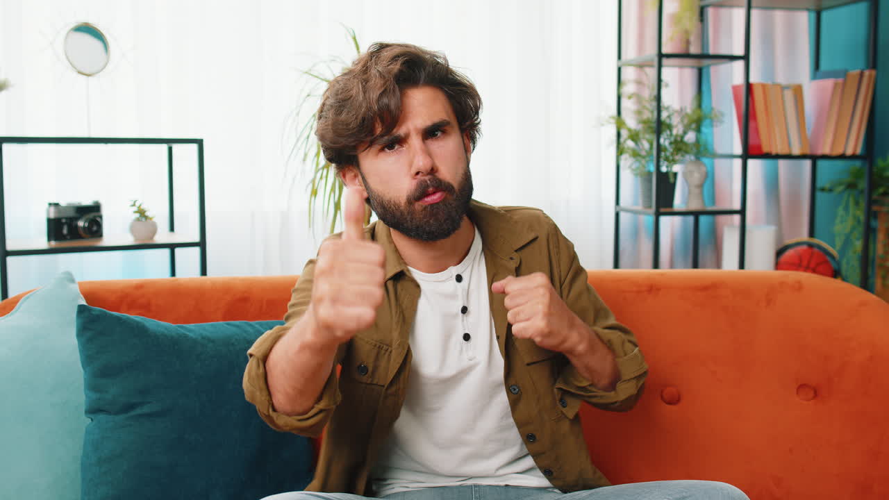 Excited happy young man surprised shocked by sudden victory good win news celebrating wow reaction