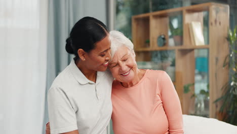 Senior-woman,-nurse-and-hug-with-healthcare