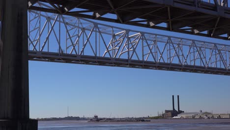 the crescent city bridge with new orleans louisiana in the background 1