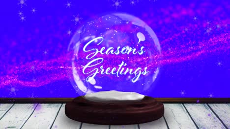 Animation-of-season's-greetings-text-in-snow-globe-and-shooting-star-on-blue-background