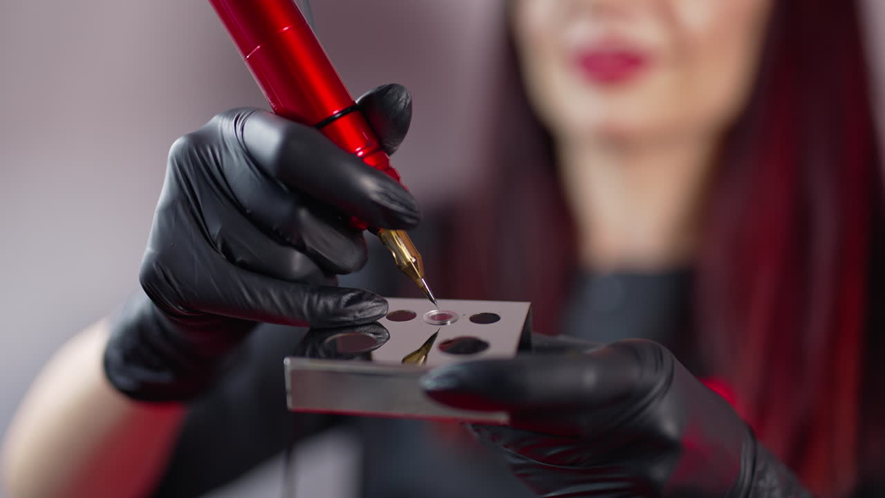 Preparing before permanent makeup. Preparation of the needle before the eyebrow tattoo