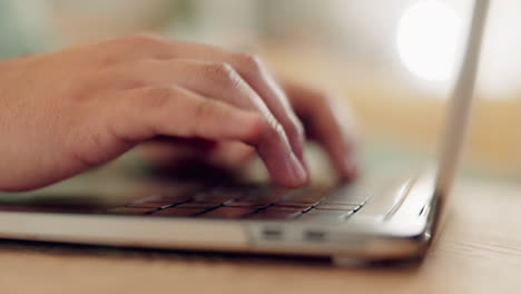 Laptop-keyboard,-hands-and-person-typing-website