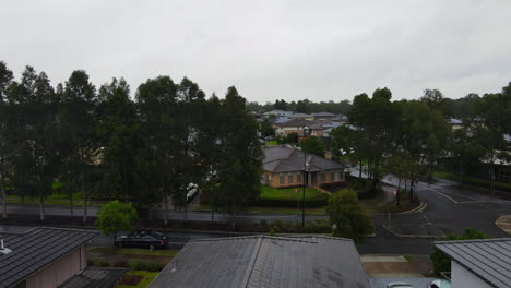 rising-drone-shot-of-Australian-residential-suburb-large-houses---Colebee-NSW