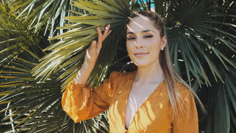 stylish young woman standing outdoors.