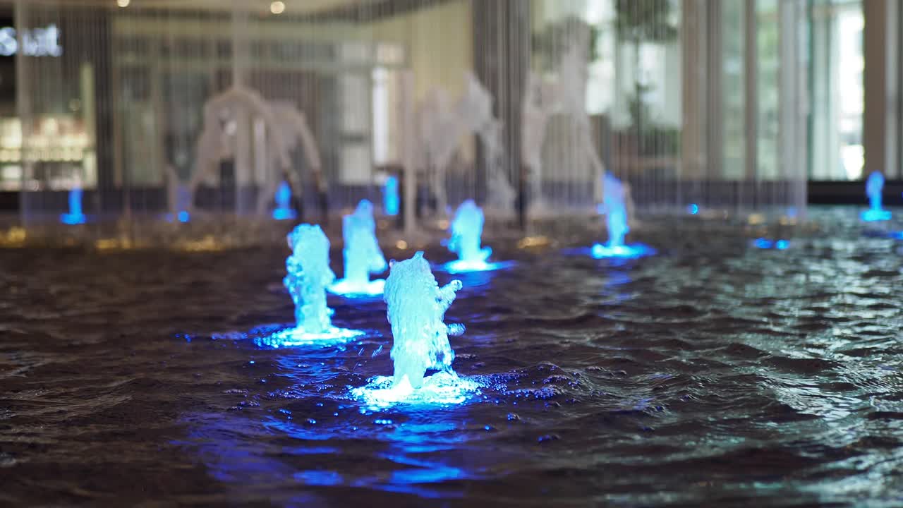 Illuminated Indoor Fountain in a Shopping Mall