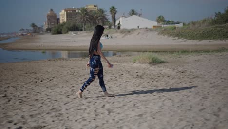 woman walking on a sunny beach