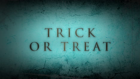 Trick-or-Treat-on-dark-blue-grunge-wall