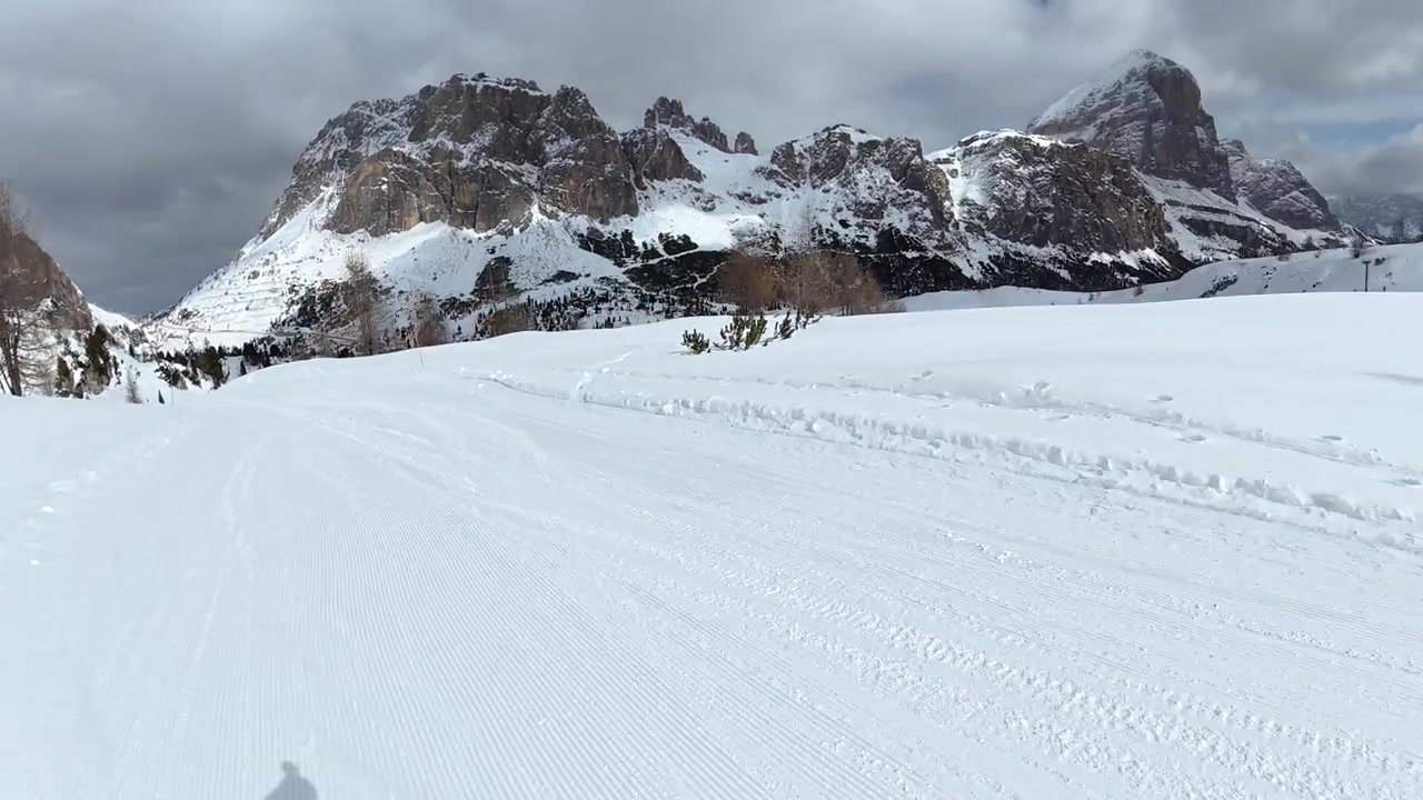 First-Person View of Skiing Down a Groomed Mountain Slope