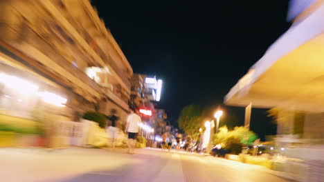 hyperlapse of moving through the busy night street