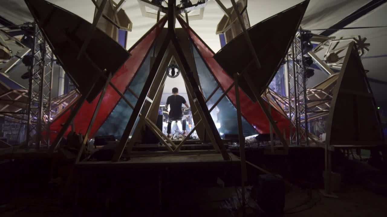 Drummer playing live on stage