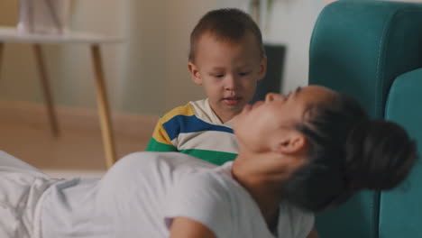 mother and child bonding with exercise and relaxation