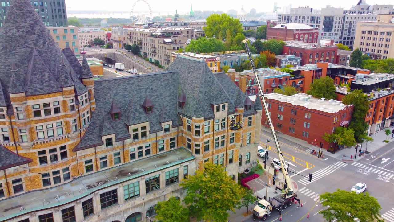 Maintenance work on the crane at Place Gare Viger in Montreal, Canada