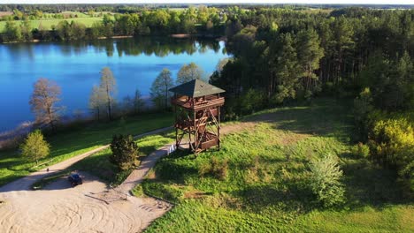 an observation tower over an epic lake