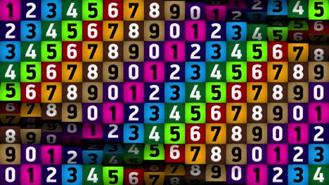 una pared de cubos giratorios multicolores con números.