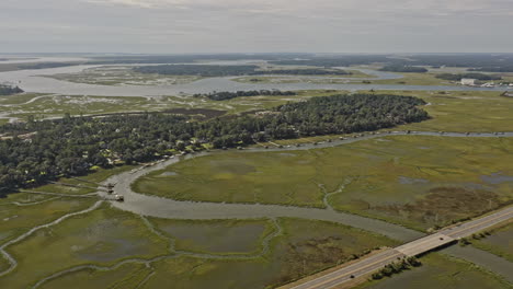 savannah georgia aerial v51 panoramic birds eye view panning landscape shot capturing the natural beauty of green wetland with interstate highway 80 across the whitemarsh island - october 2020