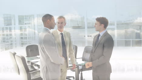 animation of businessman handshake over cityscape