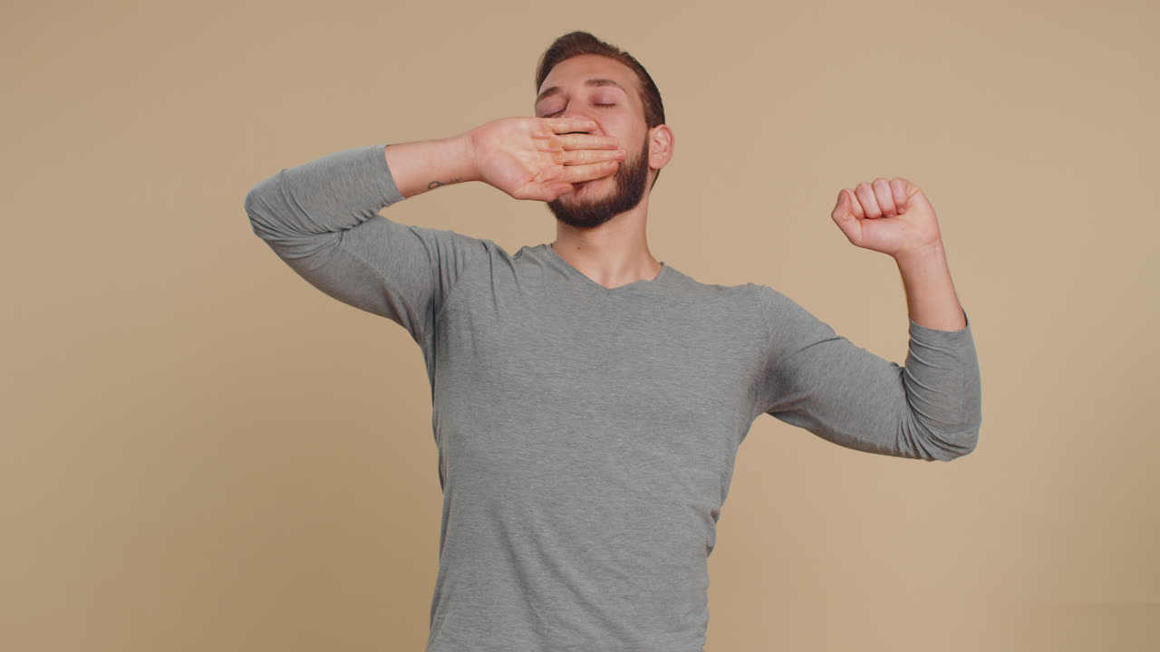 Lebanese man yawning sleepy inattentive feeling somnolent lazy bored gaping suffering lack of sleep