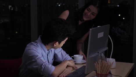 boss bring coffee to the tired and sleepy employee at the late night