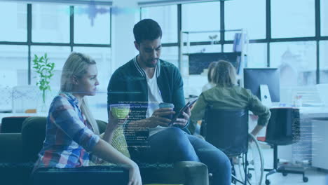 two professionals holding coffee cups reviewing tablet in lounge, with animated marketing graphs