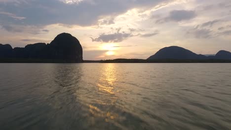 Sunset-above-the-Beautiful-Sea-with-Limestone-Cliffs-in-Phang-Nga-Bay