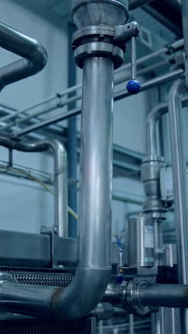steel industry factory for making cheese. milk producing stainless factory technology. vertical video