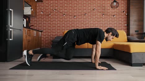 Slender-man-doing-running-plank-exercise-at-home
