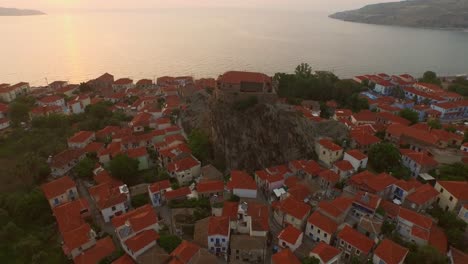 Aerial:-Sunset-at-the-town-of-Petra-on-Lesbos,-Greece