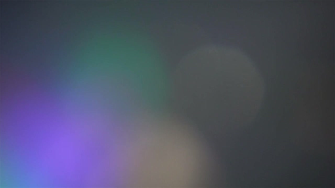 Sfondo astratto e colorato con fughe di luce e bagliori dell'obiettivo