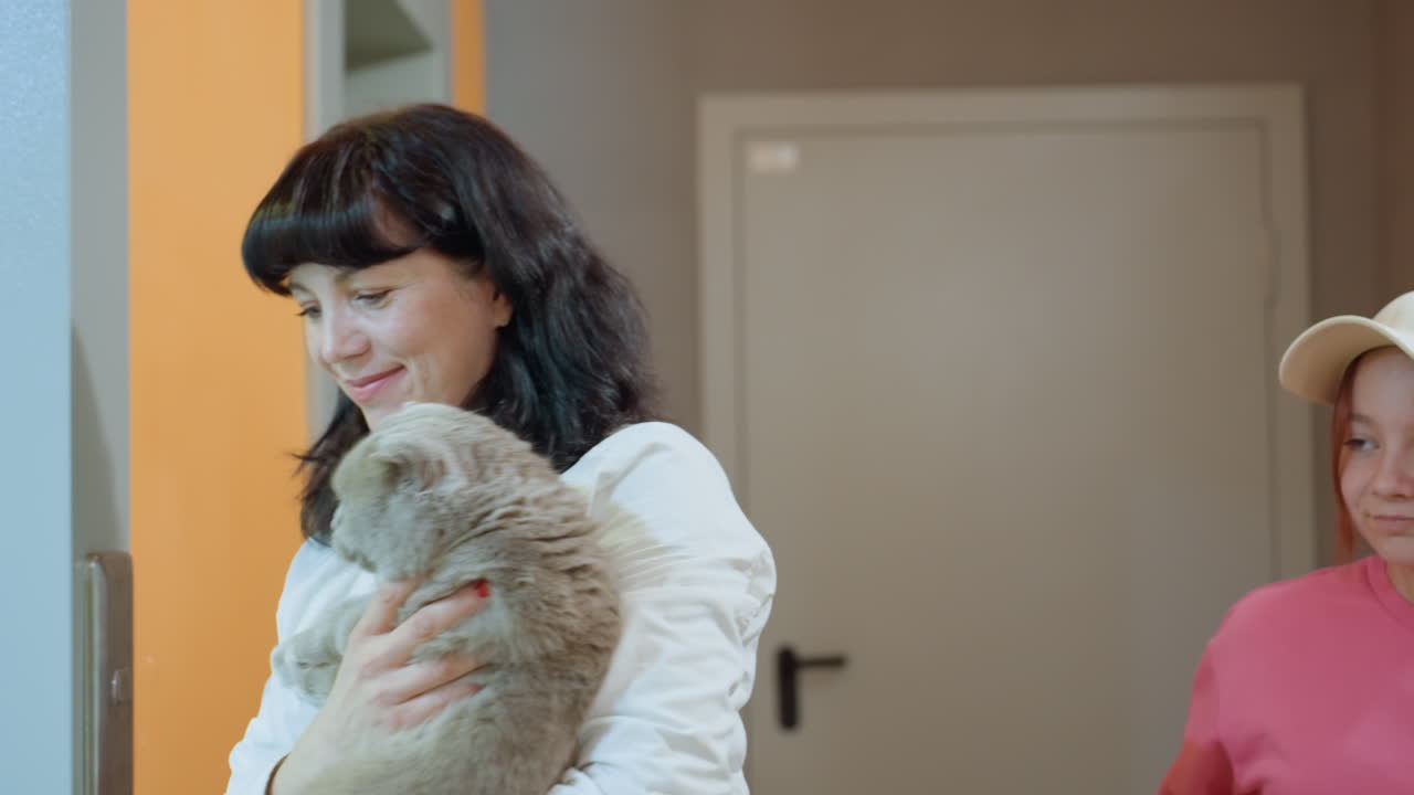 Graceful Woman Accompanied By Feline And Young Girl, Elegant Female Figure With Kitten And Youthful Girl In Elevator, Sophisticated Woman Alongside Small Cat And Young Girl Inside Elevator