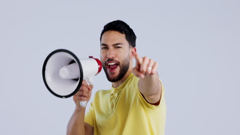 man in studio with megaphone