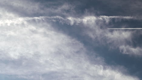 a jet leaving contrails in its wake