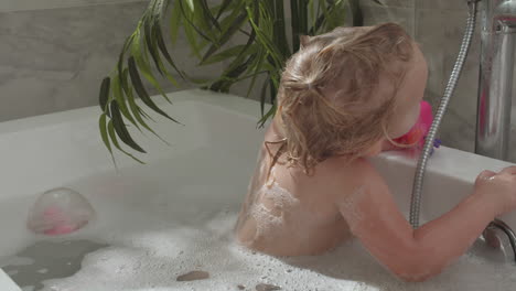 playful little child in the bath