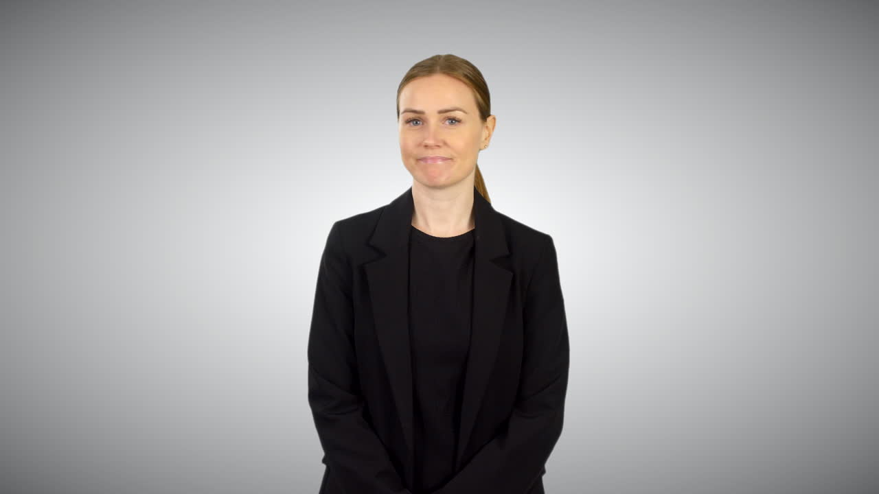 A business woman shaking head saying no with a negative gesture