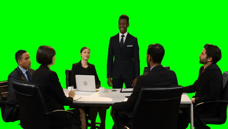 Businessman-touching-invisible-screen-during-meeting