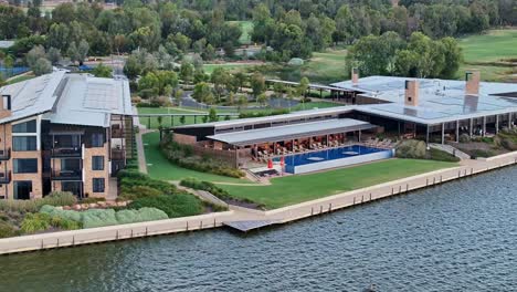 Close and low aerial view of accommodation and swimming pool at Sebel Hotel in Yarrawonga