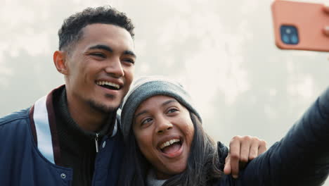 Selfie,-love-and-a-couple-hiking-in-nature