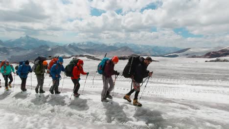 hikers on a glacier