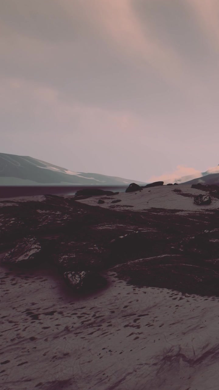 Mountains and snow under cloudy sky in iceland near a rocky landscape