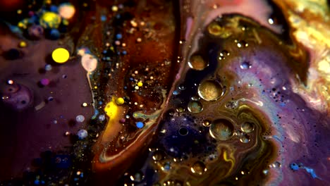 abstract colorful acrylic and food paint bubbles on water