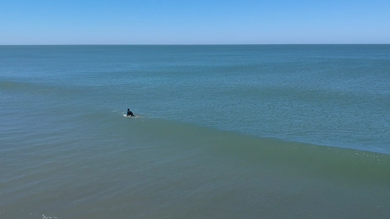 AERIAL FOOTAGE FROM THREE SURFERS IN VILLA GESELL