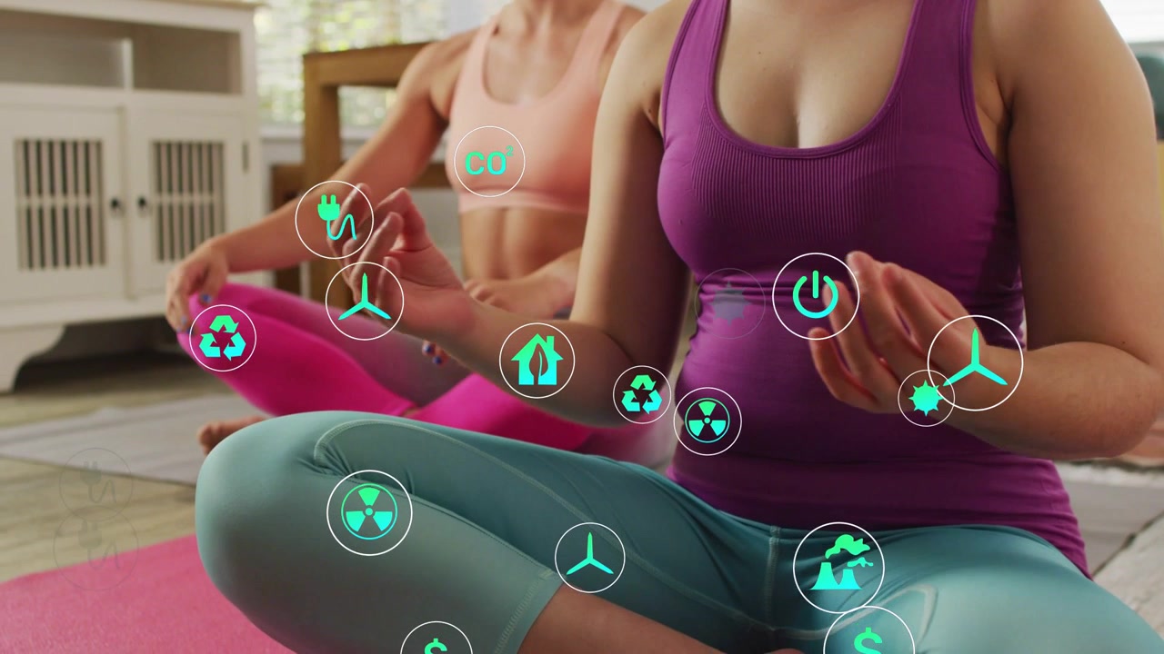 Dos mujeres sentadas realizando el mudra Gyan, con iconos emergiendo desde la parte inferior izquierda, creciendo cerca de sus manos y mostrando datos de energía.