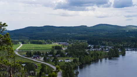 Time-lapse-of-a-small-town-by-a-river-in-northern-Sweden