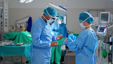 surgeon mask, gloves and nurse help with dressing