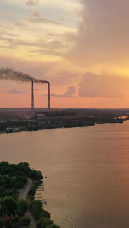 Atmospheric view of river. Aerial view of river at sunset Vertical video