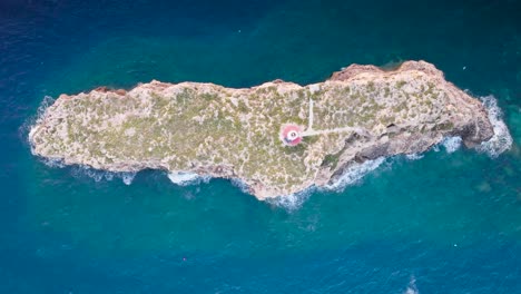 Aerial-Top-Down-Descend-Over-Punta-De-El-Toro-Rock-Formation,-Mallorca