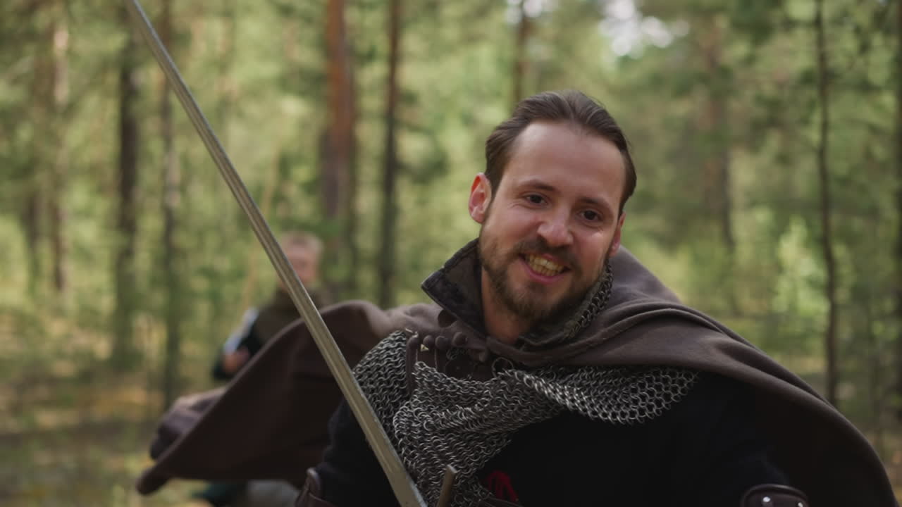 Knight with chain mail and sword runs to attack enemies