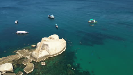 large boulder for rock jumping in tanote bay, koh tao island, thailand