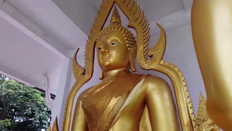 big golden buddha sculture, close up